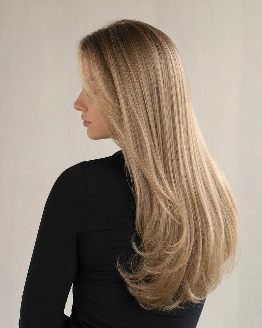 Glossy freshly toned beige-blonde lengths