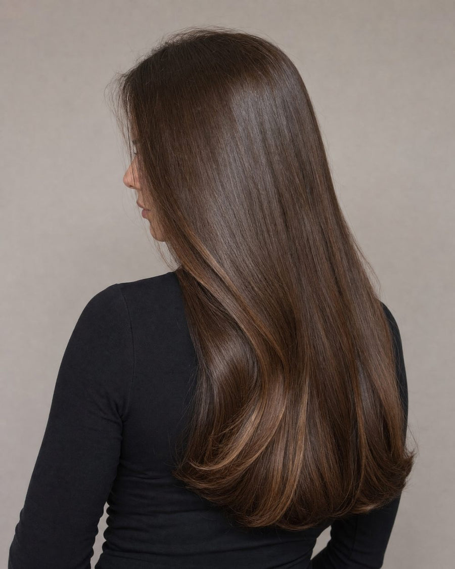 Long glossy healthy hair after an in-salon treatment